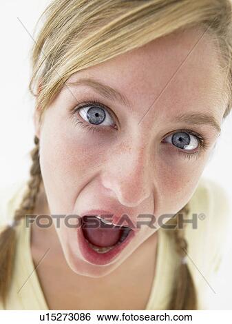 Portrait Of Teenage Girl Looking Shocked View Large Photo Image Stock Photograph - Portrait Of Teenage Girl Looking Shocked. Fotosearch