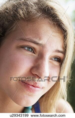 Portrait Of Teenage Girl Looking Worried View Large Photo Image Stock Photo - Portrait Of Teenage Girl Looking Worried. Fotosearch