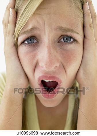 Stock Photo - Portrait Of Teenage Girl Screaming. Fotosearch