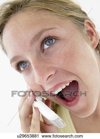 Portrait Of Teenage Girl Smiling And Talking On Cellphone View Large Photo Image Stock Image - Portrait Of Teenage Girl Smiling And Talking On Cellphone. Fotosearch