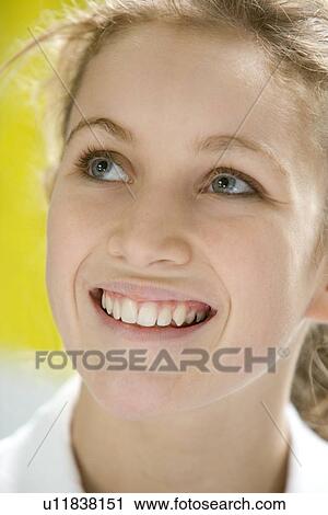 Stock Image - Portrait Of Teenage Girl Smiling. Fotosearch