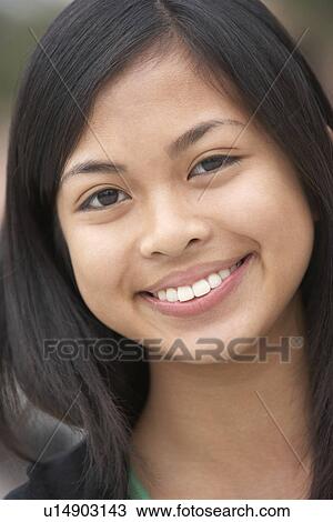 Stock Image - Portrait Of Teenage Girl Smiling. Fotosearch