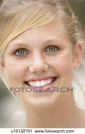 Stock Image - Portrait Of Teenage Girl Smiling. Fotosearch