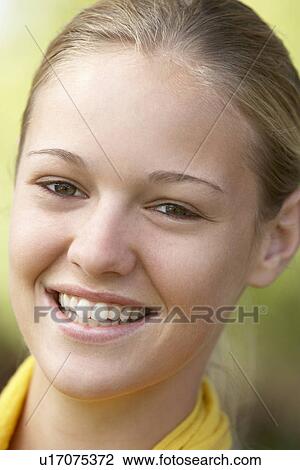 Stock Image - Portrait Of Teenage Girl Smiling. Fotosearch