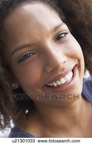 Stock Image - Portrait Of Teenage Girl Smiling. Fotosearch
