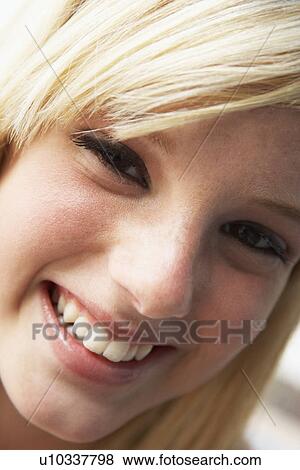 Stock Photo - Portrait Of Teenage Girl Smiling. Fotosearch