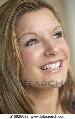 Stock Photo - Portrait Of Teenage Girl Smiling. Fotosearch