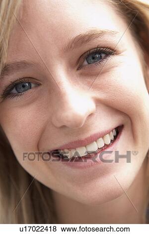 Stock Photo - Portrait Of Teenage Girl Smiling. Fotosearch