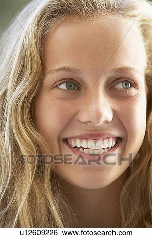 Stock Photograph - Portrait Of Teenage Girl Smiling. Fotosearch