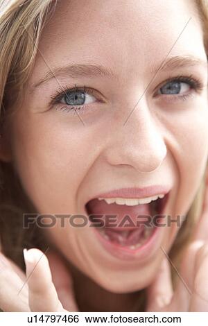 Stock Photograph - Portrait Of Teenage Girl Smiling. Fotosearch
