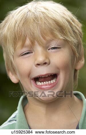 Portrait Of Young Boy Laughing View Large Photo Image Picture - Portrait Of Young Boy Laughing. Fotosearch