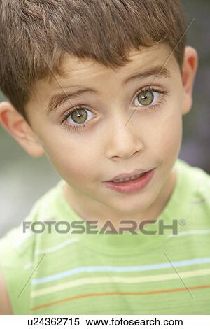 Portrait Of Young Boy Looking Surprised View Large Photo Image Stock Photography - Portrait Of Young Boy Looking Surprised. Fotosearch