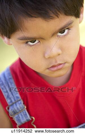 Portrait Of Young Boy Sulking View Large Photo Image Stock Image - Portrait Of Young Boy Sulking. Fotosearch