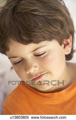 Portrait Of Young Boy Sulking View Large Photo Image Stock Photography - Portrait Of Young Boy Sulking. Fotosearch