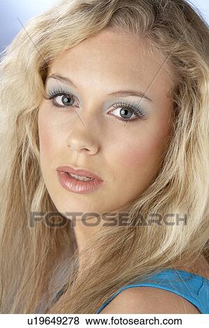 Portrait Of Young Woman Looking At Camera View Large Photo Image Stock Photo - Portrait Of Young Woman Looking At Camera. Fotosearch