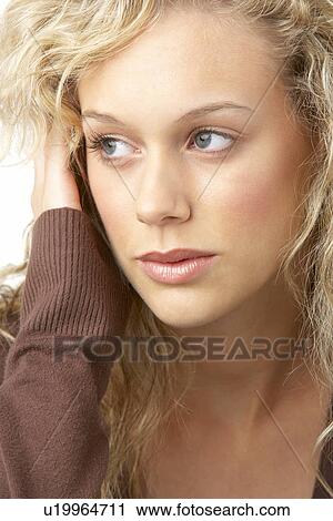 Portrait Of Young Woman Looking Thoughtful View Large Photo Image Stock Image - Portrait Of Young Woman Looking Thoughtful. Fotosearch