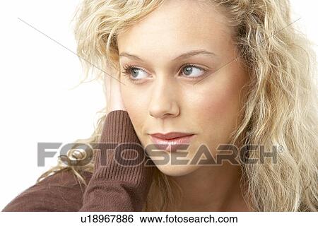 Portrait Of Young Woman Looking Thoughtful View Large Photo Image Stock Photograph - Portrait Of Young Woman Looking Thoughtful. Fotosearch