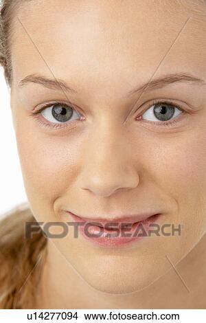 Picture - Portrait Of Young Woman Smiling At The Camera. Fotosearch