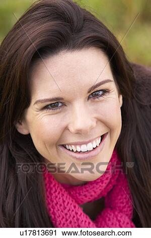 Stock Image - Portrait Of Young Woman Smiling. Fotosearch