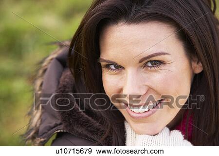 Stock Photo - Portrait Of Young Woman Smiling. Fotosearch