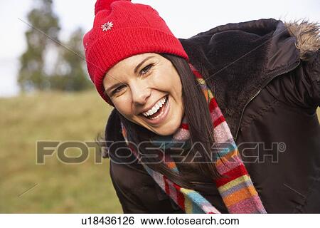 Stock Photograph - Portrait Of Young Woman Smiling. Fotosearch