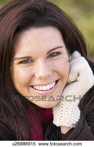 Stock Photography - Portrait Of Young Woman Smiling. Fotosearch