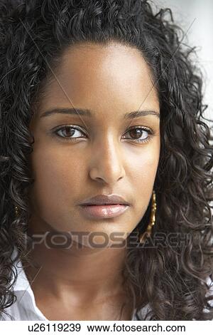 Stock Photo - Portrait Of Young Woman. Fotosearch