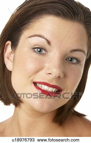 Stock Image - Portrait Of Young Woman With Red Lipstick. Fotosearch