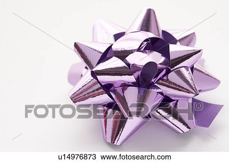 Purple Gift Wrap Bow Against White Background View Large Photo Image Stock Image - Purple Gift Wrap Bow Against White Background. Fotosearch