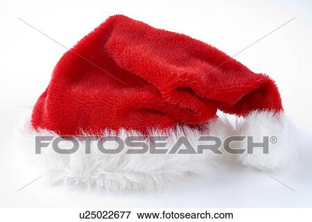Stock Photo - Red Santa Hat Against White Studio Background. Fotosearch
