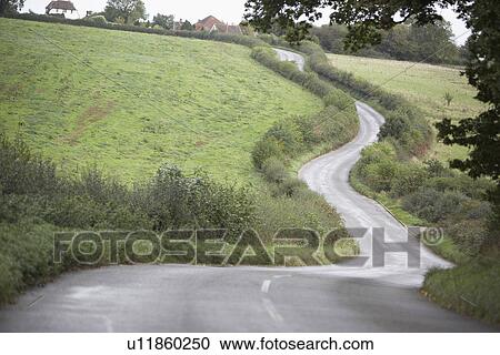 Road Winding Its Way Through The Countryside View Large Photo Image Stock Image - Road Winding Its Way Through The Countryside. Fotosearch