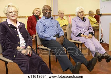 Senior adults in a stretching class View Large Photo Image Picture - Senior adults in a stretching class. Fotosearch