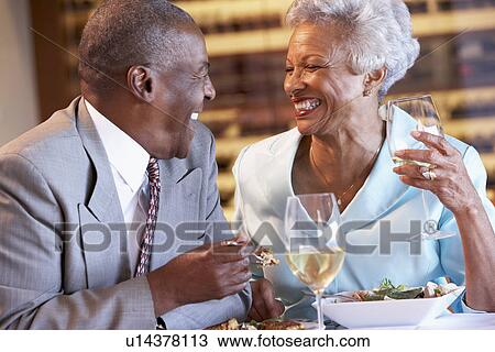 Senior Couple Having Dinner Together At A Restaurant View Large Photo Image Stock Image - Senior Couple Having Dinner Together At A Restaurant. Fotosearch