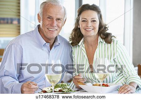 Stock Photo - Senior Couple Having Lunch Together At A Restaurant. Fotosearch