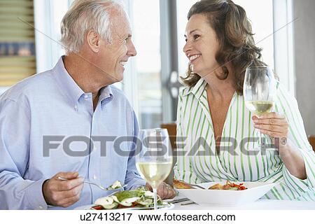 Senior Couple Having Lunch Together At A Restaurant View Large Photo Image Stock Photo - Senior Couple Having Lunch Together At A Restaurant. Fotosearch