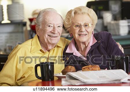 Senior couple having morning tea together View Large Photo Image Stock Photograph - Senior couple having morning tea together. Fotosearch