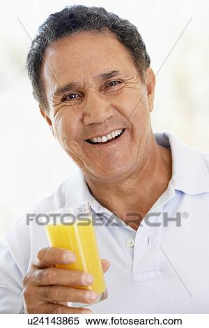 Senior Man Drinking Fresh Orange Juice View Large Photo Image Stock Photography - Senior Man Drinking Fresh Orange Juice. Fotosearch