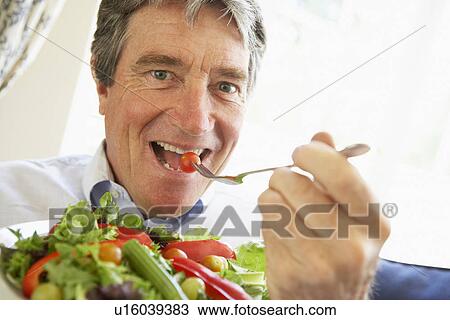 Senior Man Eating Salad View Large Photo Image Stock Image - Senior Man Eating Salad. Fotosearch