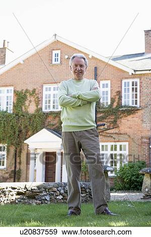 Senior Man Standing Outside House View Large Photo Image Stock Photo - Senior Man Standing Outside House. Fotosearch