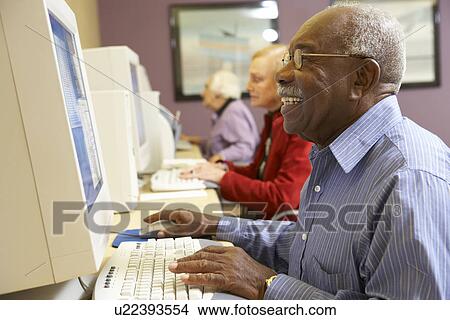 Senior man using computer View Large Photo Image Picture - Senior man using computer. Fotosearch