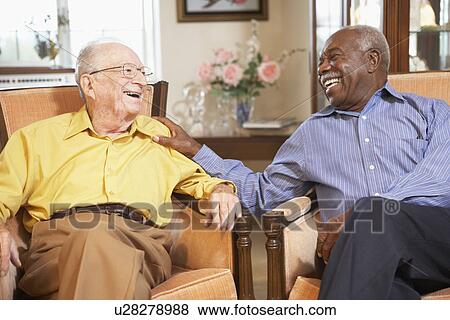 Senior men relaxing in armchairs View Large Photo Image Stock Photo - Senior men relaxing in armchairs. Fotosearch