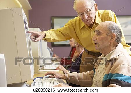 Senior men using computer View Large Photo Image Stock Photograph - Senior men using computer. Fotosearch