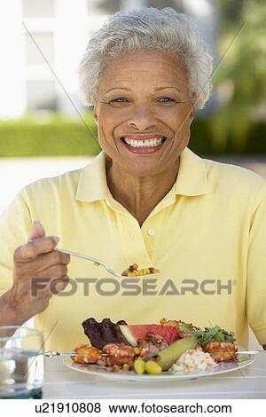 Senior Woman Dining Al Fresco View Large Photo Image Stock Photo - Senior Woman Dining Al Fresco. Fotosearch