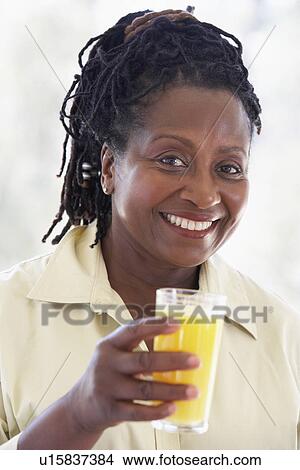 Senior Woman Drinking Fresh Orange Juice View Large Photo Image Picture - Senior Woman Drinking Fresh Orange Juice. Fotosearch