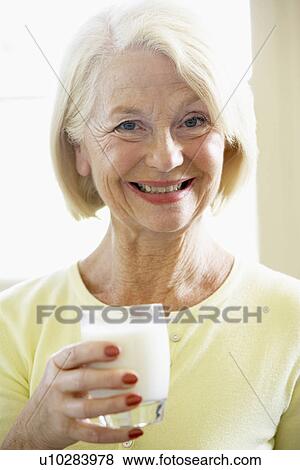 Senior Woman Drinking Milk View Large Photo Image Stock Photo - Senior Woman Drinking Milk. Fotosearch