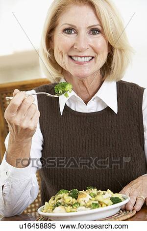 Senior Woman Eating A Healthy Meal View Large Photo Image Stock Photography - Senior Woman Eating A Healthy Meal. Fotosearch