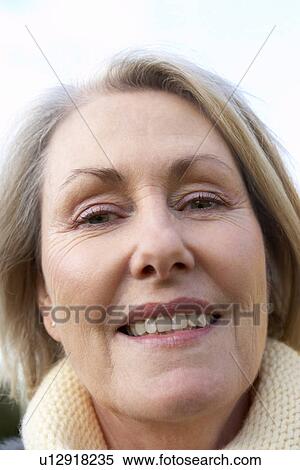 Stock Photography - Senior Woman Smiling At The Camera. Fotosearch