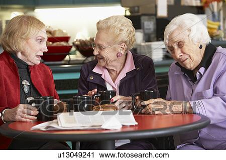Senior women drinking tea together View Large Photo Image Stock Image - Senior women drinking tea together. Fotosearch
