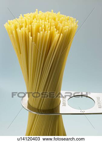 Spaghetti Pasta Being Measured View Large Photo Image Stock Image - Spaghetti Pasta Being Measured. Fotosearch