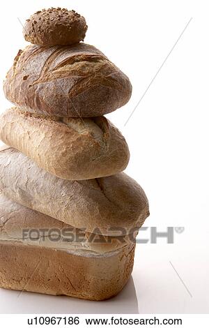 Stock Photograph - Stack Of Different Breads. Fotosearch